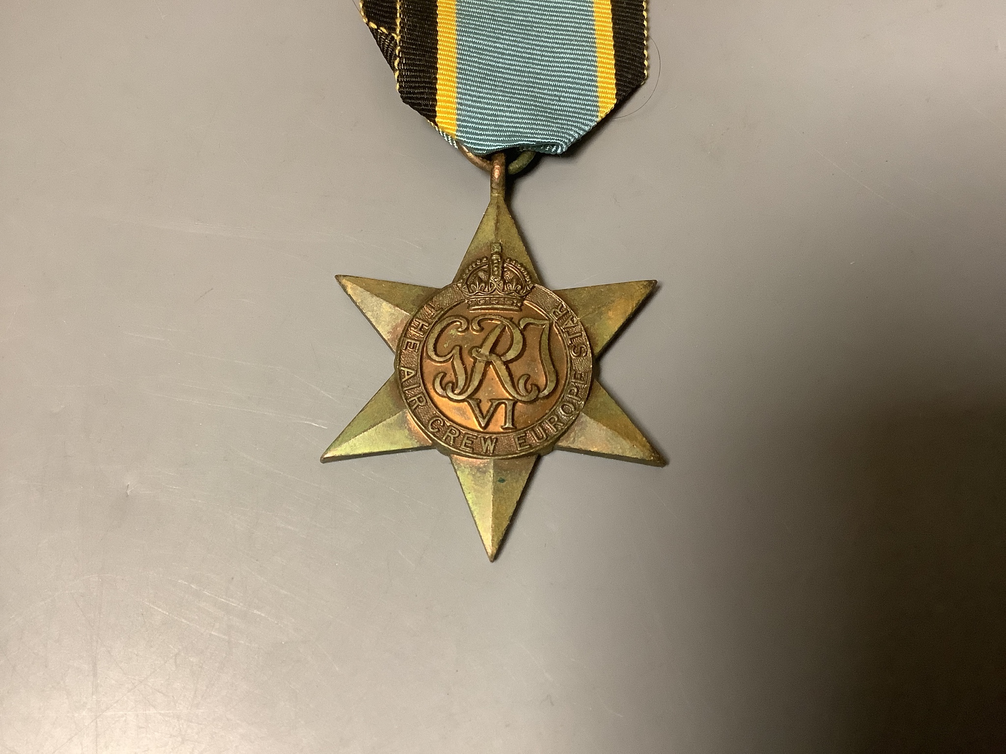 Fifteen unnamed WW2 medals to include Aircrew Europe star, 1939-1945 star (two), the Africa star, the Pacific, the Burma star, The Italy star (two), the Defence medal (two), France and Germany star, Canadian silver Defen
